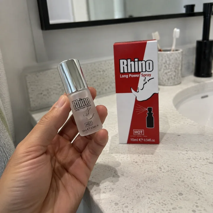 The 10 ml Rhino Long Power Spray held beside its carton on a bathroom counter